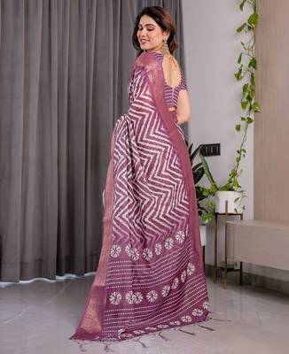 Pure linen weaved with golden zari handloom saree with floral print and designer tassels 2
