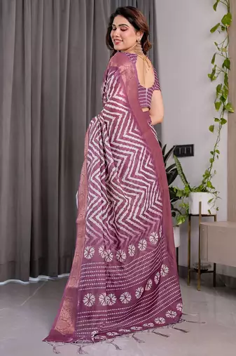 Pure linen weaved with golden zari handloom saree with floral print and designer tassels