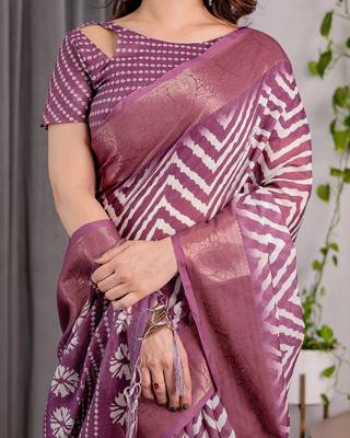 Pure linen weaved with golden zari handloom saree with floral print and designer tassels 4