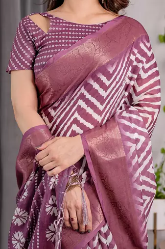 Pure linen weaved with golden zari handloom saree with floral print and designer tassels