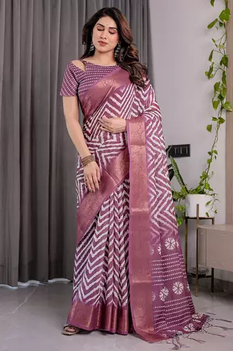 Pure linen weaved with golden zari handloom saree with floral print and designer tassels