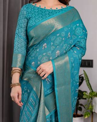 Floral printed linen weaved with golden zari saree in handloom weave with blouse piece     5.5m 5