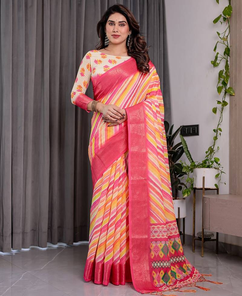 Traditional handloom linen weaved with golden zari floral saree with matching blouse & tassel detailing