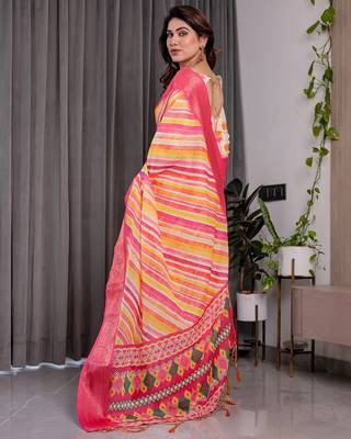 Traditional handloom linen weaved with golden zari floral saree with matching blouse & tassel detailing 3