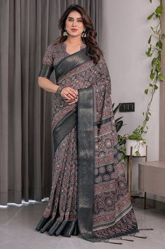 Graceful handloom linen weaved with golden zari saree with artistic floral print & tassels