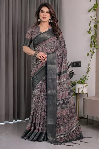 Graceful handloom linen weaved with golden zari saree with artistic floral print & tassels