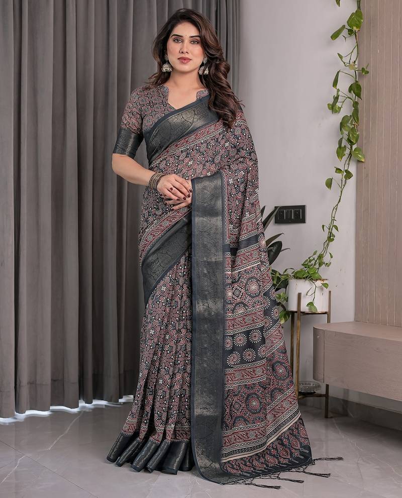 Graceful handloom linen weaved with golden zari saree with artistic floral print & tassels