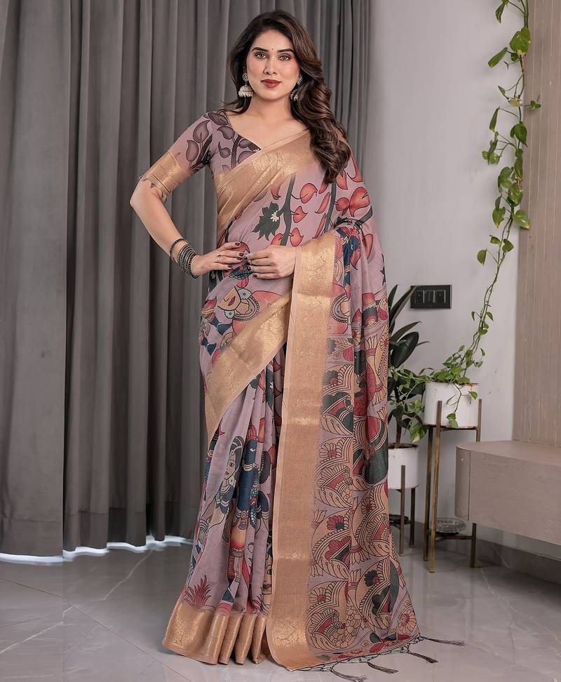 Soft handloom linen weaved with golden zari floral saree with tassels     includes 0.8m blouse