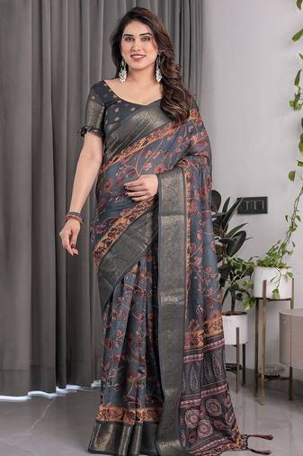 Printed floral handloom linen weaved with golden zari saree with stylish tassel finish     ready to wear