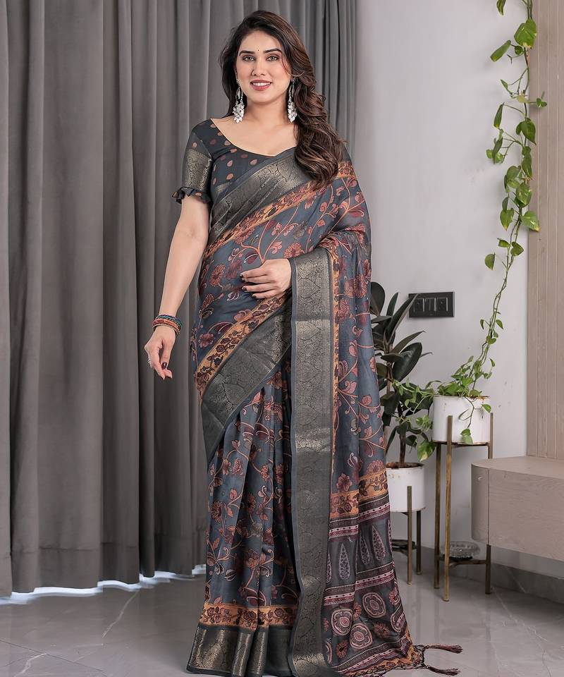Printed floral handloom linen weaved with golden zari saree with stylish tassel finish     ready to wear