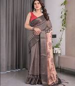 Designer floral print handloom linen weaved with golden zari saree with tassel pallu & blouse