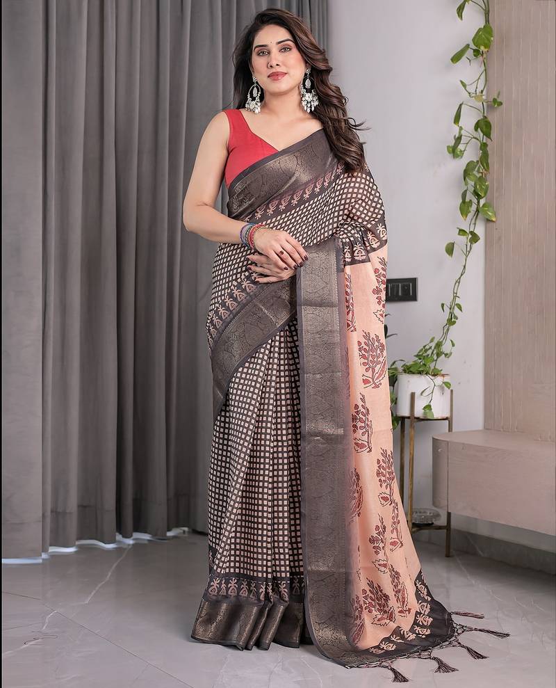 Designer floral print handloom linen weaved with golden zari saree with tassel pallu & blouse