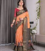 Linen weaved with golden zari handloom saree with digital floral print and tassels     festive wear