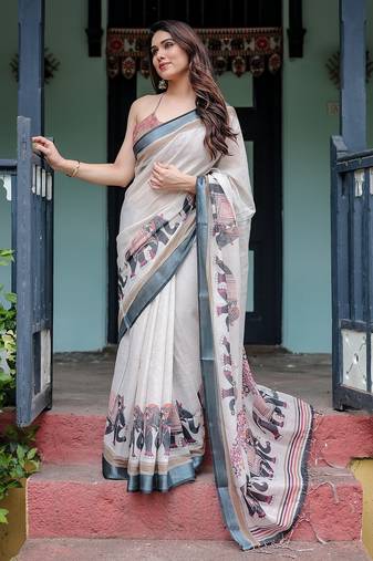 Designer floral print handloom linen saree with tassel pallu & blouse