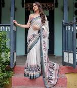 Designer floral print handloom linen saree with tassel pallu & blouse