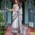 Designer floral print handloom linen saree with tassel pallu & blouse