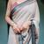 Designer floral print handloom linen saree with tassel pallu & blouse