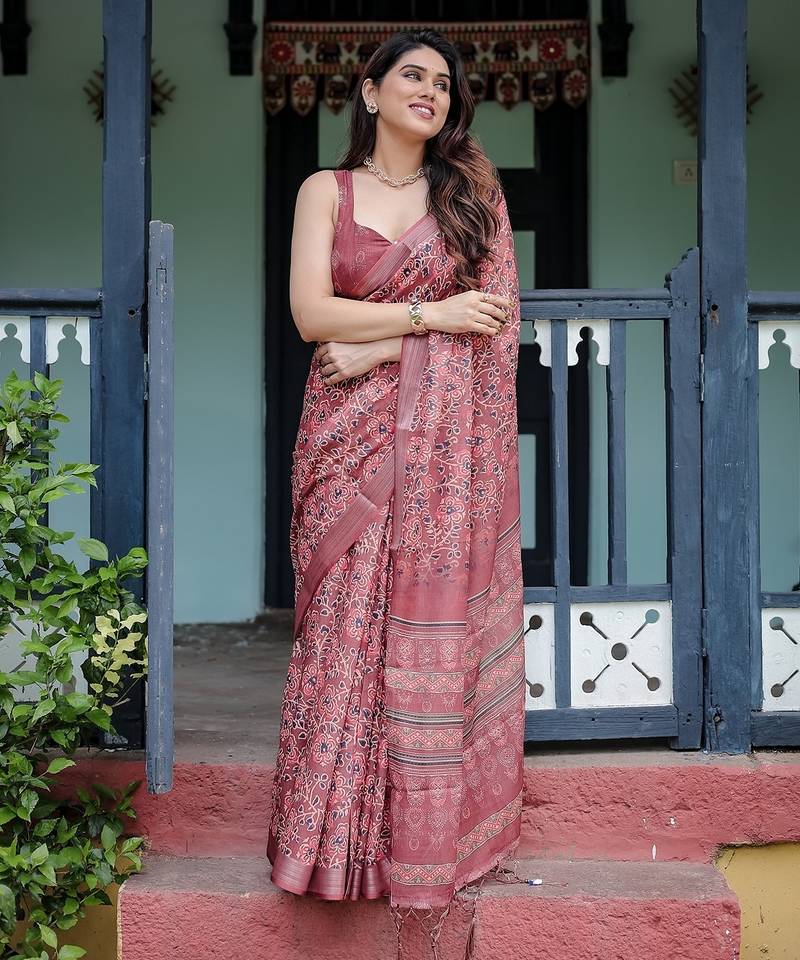 Graceful handloom linen saree with artistic floral print & tassels