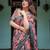 Pastel floral handloom linen saree with pallu tassels & blouse piece