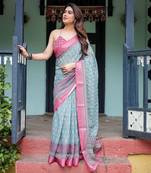 Handloom linen floral printed saree with tassels & attached blouse     5.5m