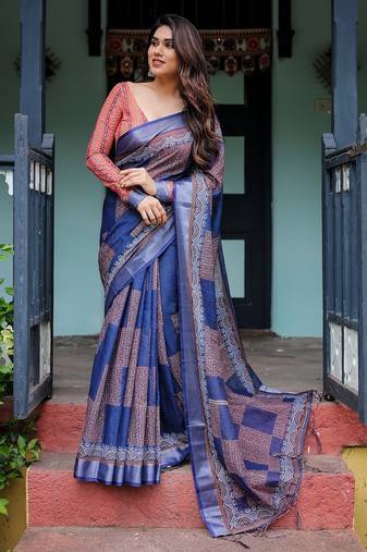 Elegant handloom linen saree with floral print & tassel edges     5.5m + 0.8m blouse
