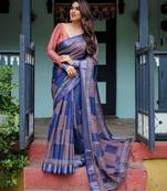 Elegant handloom linen saree with floral print & tassel edges     5.5m + 0.8m blouse