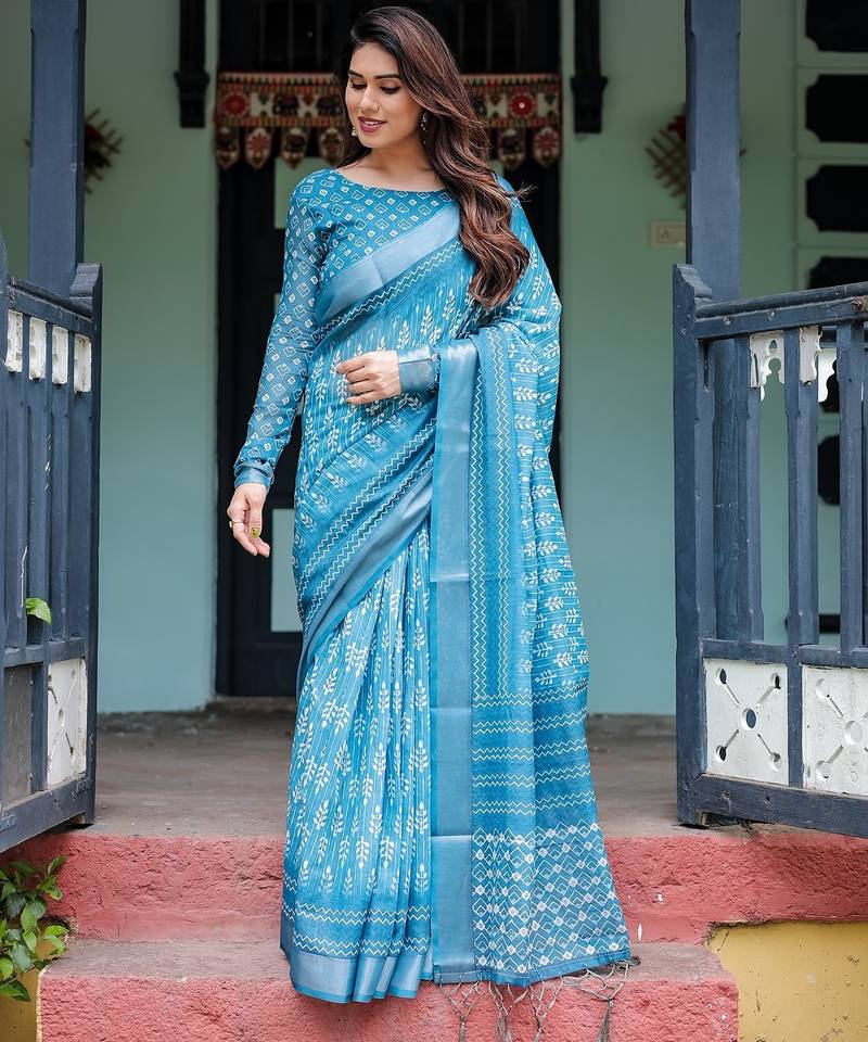 Traditional handloom linen floral saree with matching blouse & tassel detailing