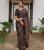 Soft handloom linen floral saree with tassels     includes 0.8m blouse