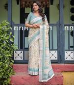 Printed floral handloom linen saree with stylish tassel finish     ready to wear