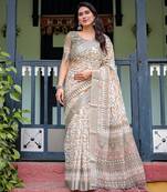 Pastel floral handloom linen saree with pallu tassels & blouse piece