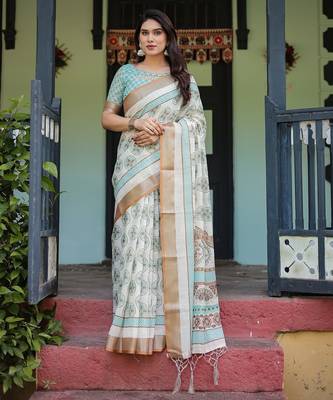 Linen cotton blend handloom saree with floral motif and tassel border 1