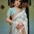 Linen cotton blend handloom saree with floral motif and tassel border
