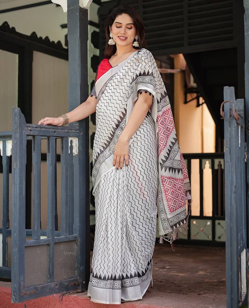 Soft handloom linen saree with multicolor floral print and tassel edges