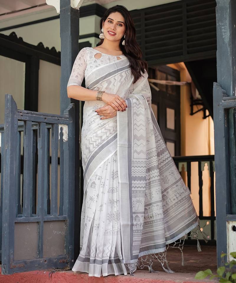 Stylish linen handloom saree with floral digital print and tassels     5.5m + 0.8m