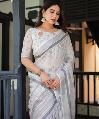 Stylish linen handloom saree with floral digital print and tassels     5.5m + 0.8m 4