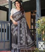 Handloom linen floral printed saree with tassels & attached blouse     5.5m