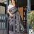 Handloom linen floral printed saree with tassels & attached blouse     5.5m