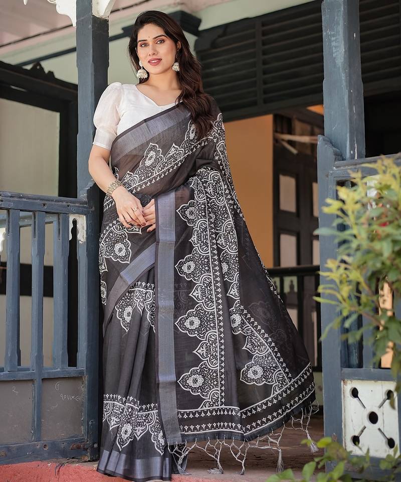 Handloom linen floral printed saree with tassels & attached blouse     5.5m