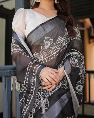 Handloom linen floral printed saree with tassels & attached blouse     5.5m 2