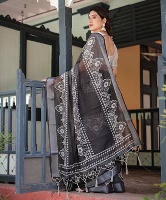 Handloom linen floral printed saree with tassels & attached blouse     5.5m 5