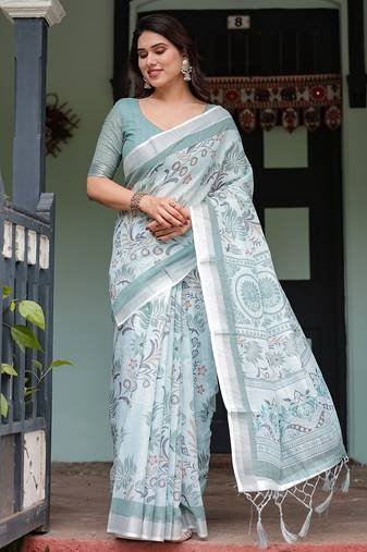 Elegant handloom linen saree with floral print & tassel edges     5.5m + 0.8m blouse