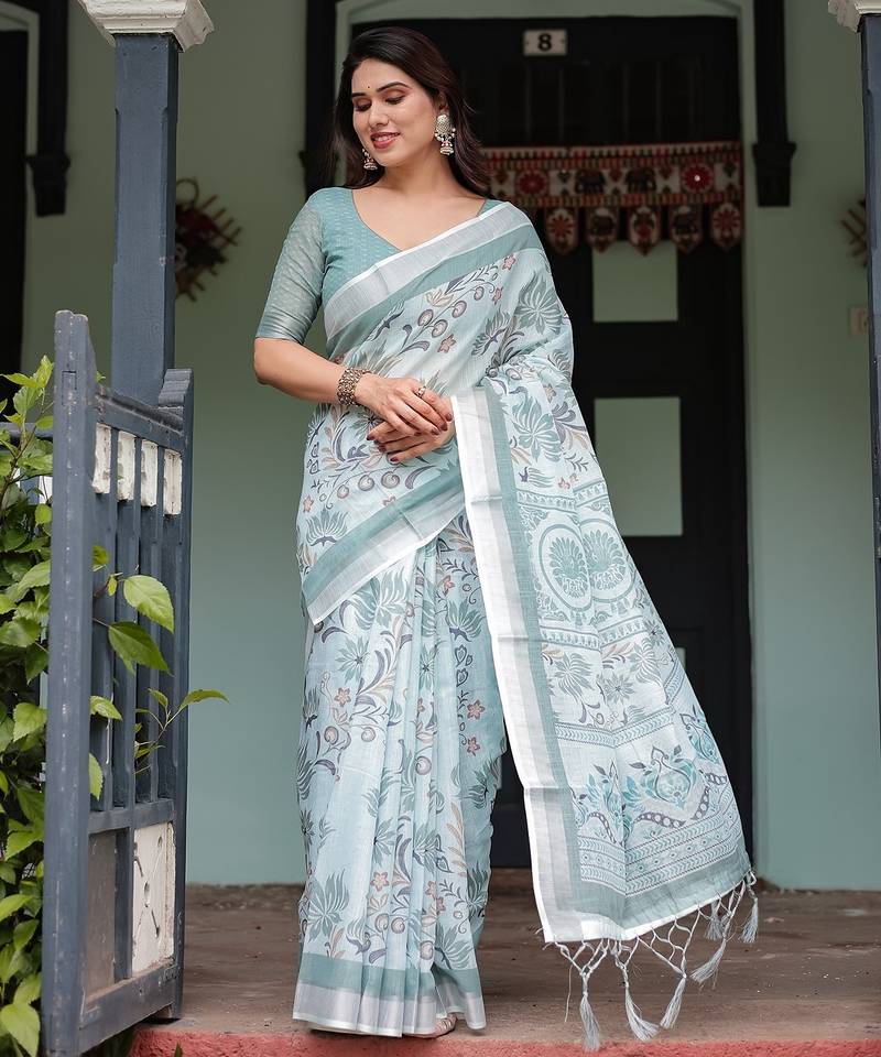 Elegant handloom linen saree with floral print & tassel edges     5.5m + 0.8m blouse