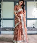 Pure linen handloom saree with floral print and designer tassels