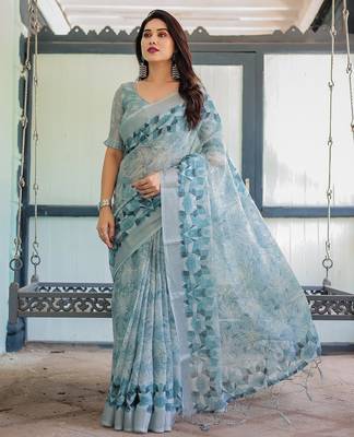 Traditional handloom linen floral saree with matching blouse & tassel detailing 1