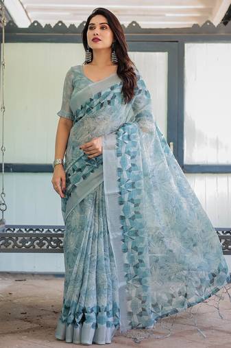 Traditional handloom linen floral saree with matching blouse & tassel detailing