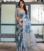 Soft handloom linen floral saree with tassels     includes 0.8m blouse