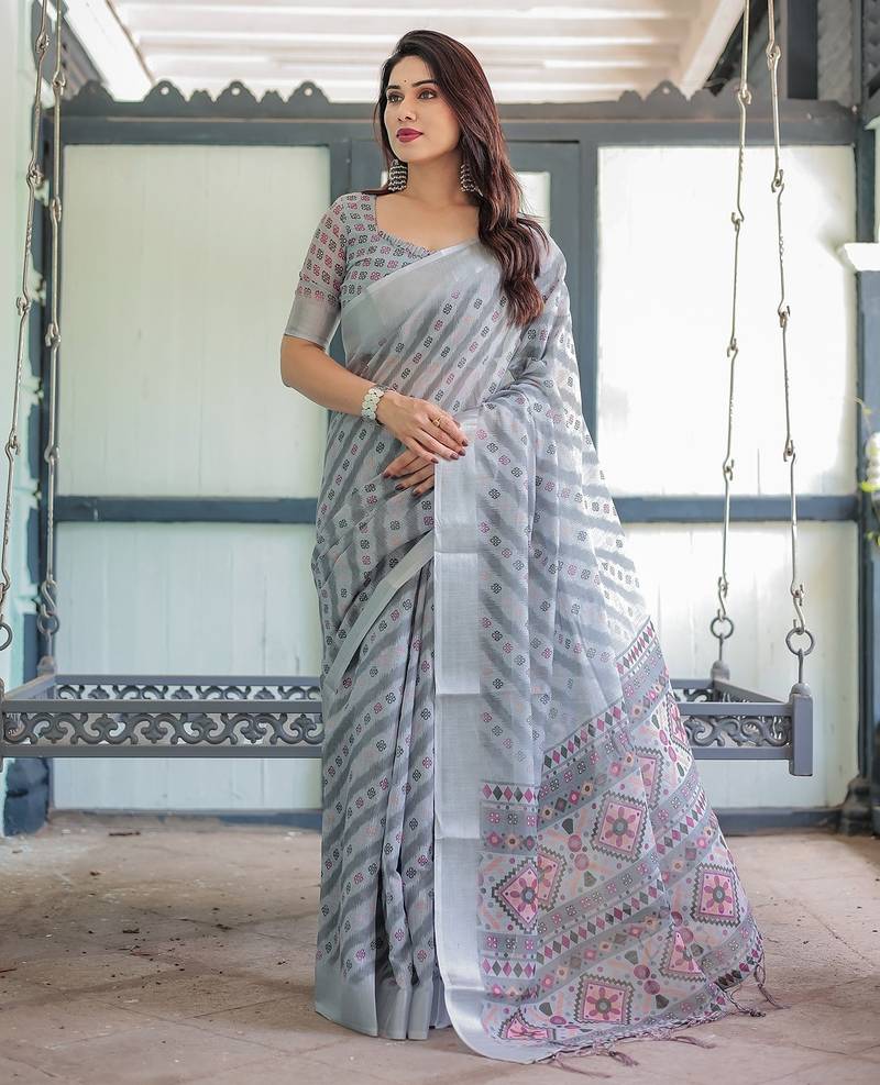 Printed floral handloom linen saree with stylish tassel finish     ready to wear