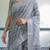 Printed floral handloom linen saree with stylish tassel finish     ready to wear