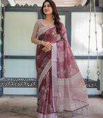 Graceful handloom linen saree with artistic floral print & tassels