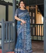 Linen cotton blend handloom saree with floral motif and tassel border